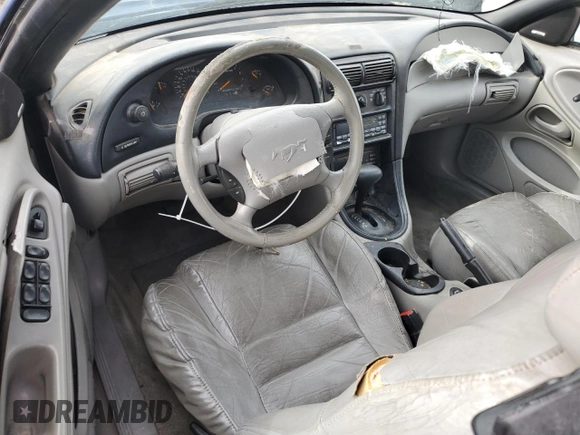 1998 Ford Mustang GT z VIN 1FAFP45X6WF186450, wystawiony jako Copart lot #45398475 z przebiegiem 124 697 mil mil oraz Szkoda całkowita • Salvage title. Historia ofert i sprzedaży dostępna na DreamBid. Obrazek 8.