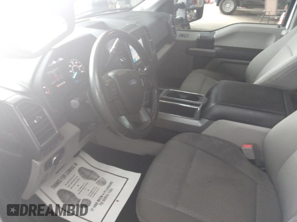 2019 Ford F-150 XL with VIN 1FTEX1C48KKE10543, listed as a IAAI auction lot 42859326 with 81,239 mi miles and . Bid and sale history available at DreamBid. Image 17.