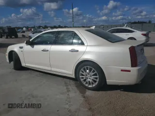 2010 Cadillac STS AWD z VIN 1G6DU6EV9A0138248, wystawiony jako Copart lot #85649154 z przebiegiem 137 227 mil mil oraz Nie do naprawy • Non repairable. Historia ofert i sprzedaży dostępna na DreamBid. Obrazek 2.