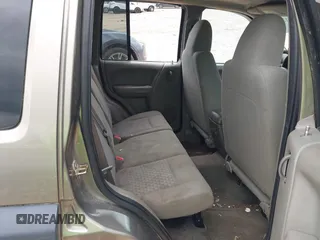 2005 Jeep Liberty Sport with VIN 1J4GL48K65W531365, listed as a IAAI auction lot 42004136 with 160,756 mi miles. Bid and sale history available at carsss.com. Image 8.
