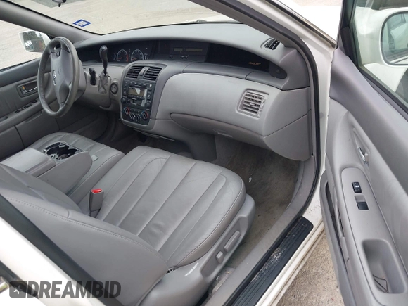2002 Toyota Avalon XL with VIN 4T1BF28B82U239876, listed as a IAAI auction lot 42142686 with 104,163 mi miles and . Bid and sale history available at DreamBid. Image 5.