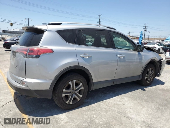 2017 Toyota RAV4 LE with VIN 2T3BFREV6HW658235, listed as a Copart auction lot 63409005 with 62,303 mi miles and Salvage title. Bid and sale history available at DreamBid. Image 3.