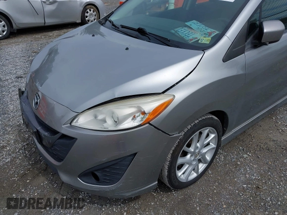 2012 Mazda 5 Touring with VIN JM1CW2CLXC0100740, listed as a IAAI auction lot 41918794 with 234,102 mi miles and . Bid and sale history available at DreamBid. Image 12.