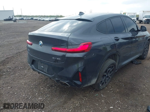 2023 BMW X4 xDrive30i with VIN 5UX33DT01P9N66552, listed as a IAAI auction lot 42103350 with 56,303 mi miles and . Bid and sale history available at DreamBid. Image 4.