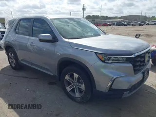 2025 Honda Pilot EX-L z VIN 5FNYG2H46SB013504, wystawiony jako IAAI lot #41777928 z przebiegiem 5 163 mil mil oraz . Historia ofert i sprzedaży dostępna na DreamBid. Obrazek 1.