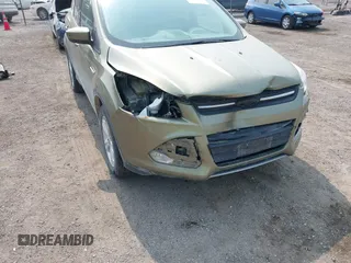 2013 Ford Escape SE z VIN 1FMCU9GX4DUC68312, wystawiony jako IAAI lot #42472030 z przebiegiem 134 070 mil mil oraz . Historia ofert i sprzedaży dostępna na DreamBid. Obrazek 6.