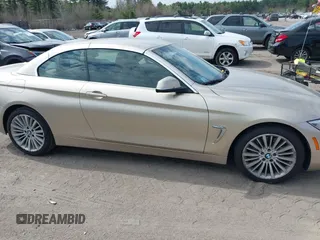 2015 BMW 4 Series 435i xDrive with VIN WBA3T7C51FP942320, listed as a IAAI auction lot 42059717 with 81,815 mi miles and . Bid and sale history available at DreamBid. Image 13.