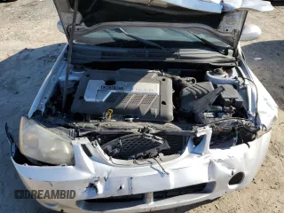 2006 Kia Spectra with VIN KNAFE161965323828, listed as a Copart auction lot 69583934 with 152,000 mi miles and Salvage Title. Bid and sale history available at carsss.com. Image 12.