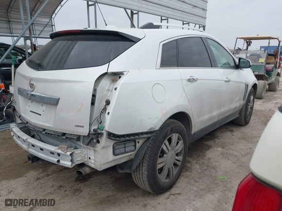 2015 Cadillac SRX Luxury Collection with VIN 3GYFNBE31FS552323, listed as a IAAI auction lot 41553081 with 91,214 mi miles. Bid and sale history available at carsss.com. Image 4.