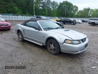 2001 Ford Mustang Deluxe z VIN 1FAFP44461F132453, wystawiony jako IAAI lot #42243068 z przebiegiem 183 171 mil mil oraz . Historia ofert i sprzedaży dostępna na DreamBid. Obrazek 1.