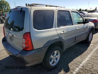 2005 Mazda Tribute i with VIN 4F2YZ02Z85KM31234, listed as a Copart auction lot 68669434 with 211,921 mi miles and Salvage Title. Bid and sale history available at carsss.com. Image 3.