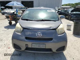 2012 Scion iQ with VIN JTNJJXB06CJ011117, listed as a Copart auction lot 52694345 with 94,547 mi miles and Salvage Title. Bid and sale history available at carsss.com. Image 5.