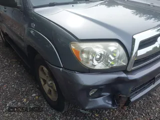 2006 Toyota 4Runner SR5 z VIN JTEBU14R960087249, wystawiony jako IAAI lot #42370575 z przebiegiem 164 150 mil mil oraz . Historia ofert i sprzedaży dostępna na DreamBid. Obrazek 6.
