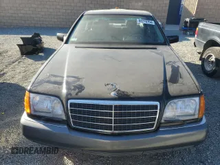 1993 Mercedes-Benz 500 z VIN WDBGA51E7PA107911, wystawiony jako Copart lot #82218754 z przebiegiem 113 328 mil mil oraz Tytuł czysty. Historia ofert i sprzedaży dostępna na DreamBid. Obrazek 5.