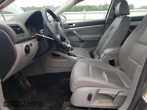 2008 Volkswagen Jetta SE with VIN 3VWRM71K08M037186, listed as a Copart auction lot 60173795 with 186,594 mi miles and Salvage title. Bid and sale history available at DreamBid. Image 7.