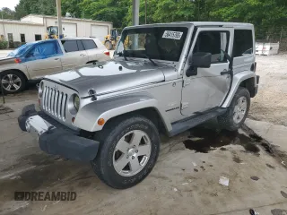 2011 Jeep Wrangler Sahara z VIN 1J4AA5D13BL546742, wystawiony jako Copart lot #56415765 z przebiegiem 60 454 mil mil oraz Szkoda całkowita • Salvage title. Historia ofert i sprzedaży dostępna na DreamBid. Obrazek 1.