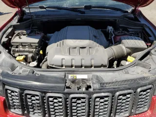 2019 Jeep Grand Cherokee Trailhawk with VIN 1C4RJFLT4KC787940, listed as a Copart auction lot 60883895 with 77,160 mi miles and Salvage title. Bid and sale history available at DreamBid. Image 11.