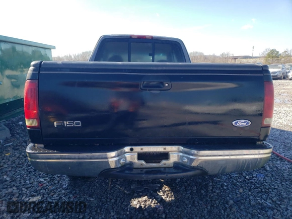 1997 Ford F-150 with VIN 1FTDX1722VNB96527, listed as a Copart auction lot 87304814 with 106,771 mi miles and Salvage title. Bid and sale history available at DreamBid. Image 6.