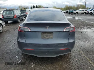 2023 Tesla Model Y Long Range z VIN 7SAYGDEE1PF937867, wystawiony jako Copart lot #51615195 z przebiegiem 88 912 mil mil oraz Szkoda całkowita • Salvage title. Historia ofert i sprzedaży dostępna na DreamBid. Obrazek 6.