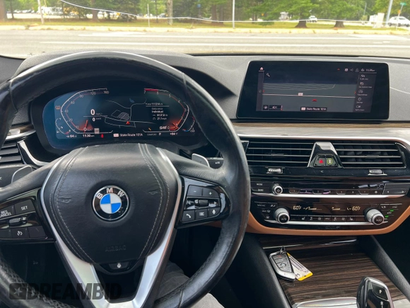 2020 BMW 5 Series 530i xDrive with VIN WBAJR7C05LCD10212, listed as a Copart auction lot 64332635 with 111,314 mi miles and Clean title. Bid and sale history available at DreamBid. Image 7.