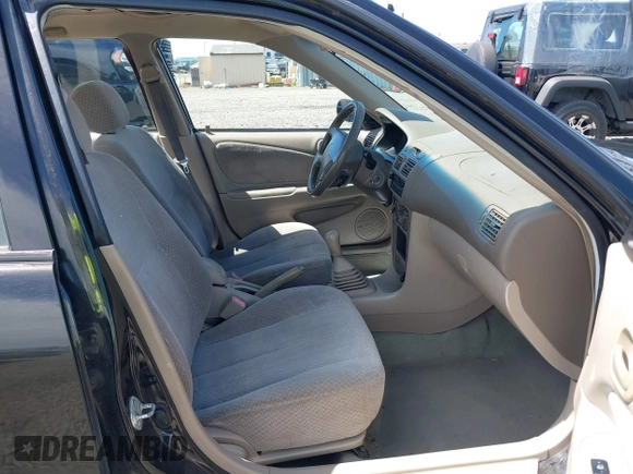 1999 Toyota Corolla VE z VIN 1NXBR12E9XZ205120, wystawiony jako IAAI lot #42216177 z przebiegiem 175 508 mil mil oraz . Historia ofert i sprzedaży dostępna na DreamBid. Obrazek 5.