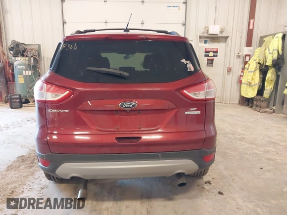 2014 Ford Escape SE with VIN 1FMCU0G99EUC78252, listed as a IAAI auction lot 41764372 with 98,662 mi miles. Bid and sale history available at carsss.com. Image 16.