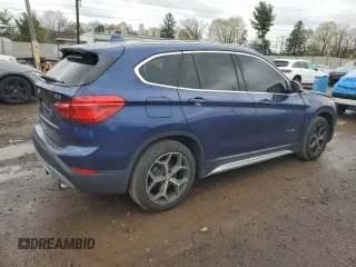 2017 BMW X1 xDrive28i with VIN WBXHT3C3XH5F69573, listed as a Copart auction lot 52719715 with 93,981 mi miles and Salvage Title. Bid and sale history available at DreamBid. Image 3.