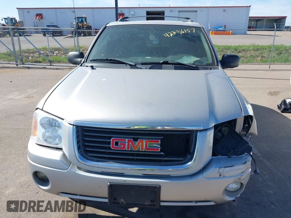 2004 GMC Envoy SLT z VIN 1GKDT13S642449872, wystawiony jako IAAI lot #42236157 z przebiegiem 205 194 mil mil oraz . Historia ofert i sprzedaży dostępna na DreamBid. Obrazek 13.