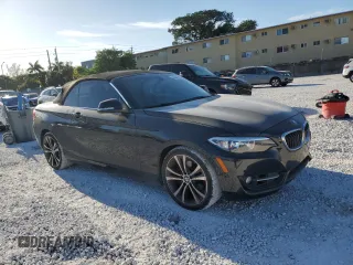 2016 BMW 2 Series 228i with VIN WBA1K9C59GV321555, listed as a Copart auction lot 49504985 with 124,471 mi miles and Salvage Title. Bid and sale history available at carsss.com. Image 4.