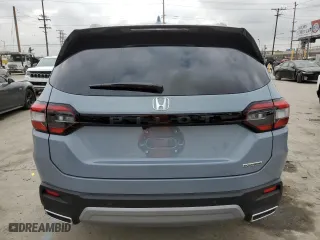 2025 Honda Pilot Touring with VIN 5FNYG2H73SB016693, listed as a Copart auction lot 54366275 with 1,259 mi miles and Salvage Title. Bid and sale history available at carsss.com. Image 6.