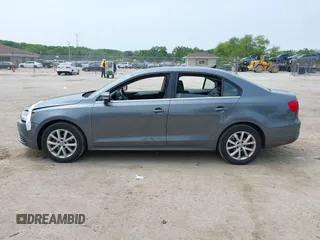 2013 Volkswagen Jetta SE with VIN 3VWBX7AJ3DM434661, listed as a IAAI auction lot 42505596 with 135,263 mi miles and . Bid and sale history available at DreamBid. Image 14.