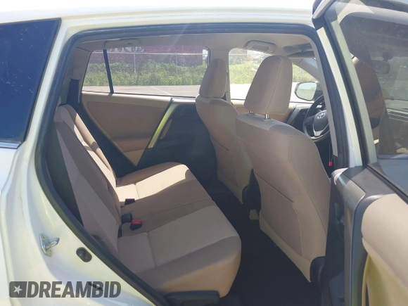 2013 Toyota RAV4 LE with VIN JTMBFREV4D5017389, listed as a IAAI auction lot 42648901 with 107,120 mi miles and . Bid and sale history available at DreamBid. Image 8.