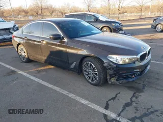 2018 BMW 5 Series 530i xDrive with VIN WBAJA7C58JWA72127, listed as a IAAI auction lot 41548417 with 80,680 mi miles. Bid and sale history available at carsss.com. Image 1.