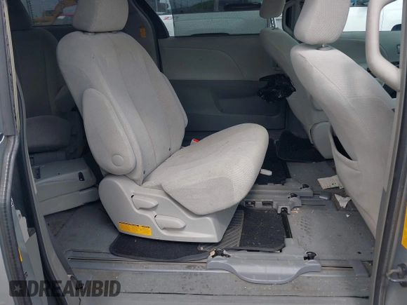 2013 Toyota Sienna LE AAS with VIN 5TDKK3DC3DS402574, listed as a IAAI auction lot 42272047 with 142,938 mi miles and . Bid and sale history available at DreamBid. Image 8.