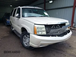 2003 Cadillac Escalade z VIN 1GYEK63NX3R241388, wystawiony jako IAAI lot #42227896 z przebiegiem 154 415 mil mil oraz . Historia ofert i sprzedaży dostępna na DreamBid. Obrazek 1.