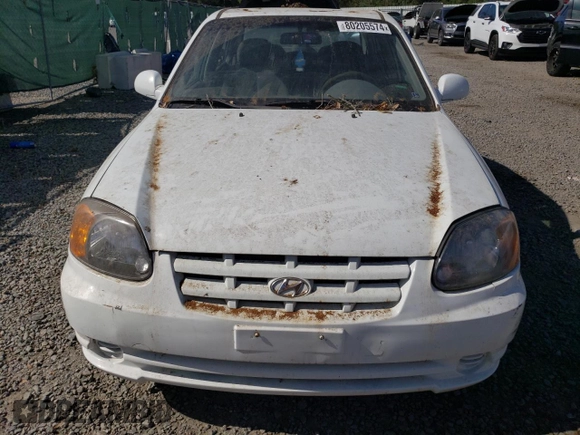 2005 Hyundai Accent GLS with VIN KMHCG45C55U664731, listed as a Copart auction lot 80205574 with 170,335 mi miles and Salvage Title. Bid and sale history available at carsss.com. Image 5.