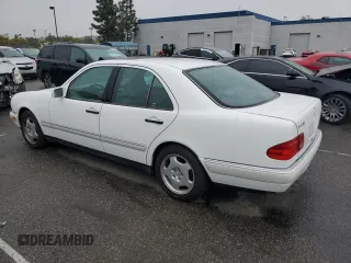 1997 Mercedes-Benz E-Class with VIN WDBJF72F2VA099305, listed as a Copart auction lot 48007935 with 96,410 mi miles and Salvage Title. Bid and sale history available at carsss.com. Image 2.