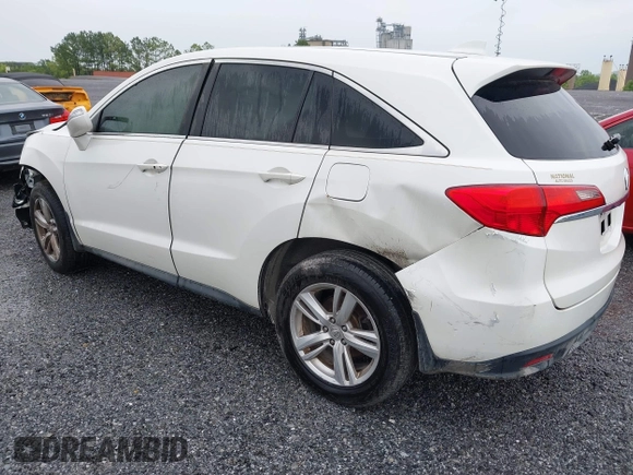 2013 Acura RDX Technology with VIN 5J8TB3H51DL017551, listed as a IAAI auction lot 41464240 with 122,863 mi miles and . Bid and sale history available at DreamBid. Image 3.