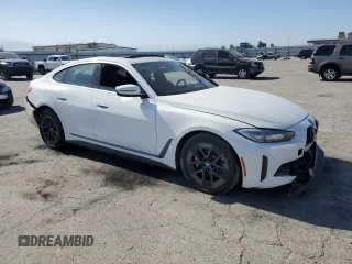 2022 BMW i4 eDrive40 with VIN WBY73AW09NFM42460, listed as a Copart auction lot 59141474 with 0 mi miles and Salvage Title. Bid and sale history available at carsss.com. Image 4.