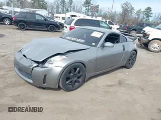 2004 Nissan 350Z Touring with VIN JN1AZ34DX4M100407, listed as a IAAI auction lot 41758380 with 154,166 mi miles. Bid and sale history available at carsss.com. Image 2.