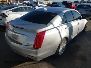 2015 Cadillac CTS AWD z VIN 1G6AW5SX2F0104981, wystawiony jako IAAI lot #41276740 z przebiegiem 87 128 mil mil oraz . Historia ofert i sprzedaży dostępna na DreamBid. Obrazek 4.