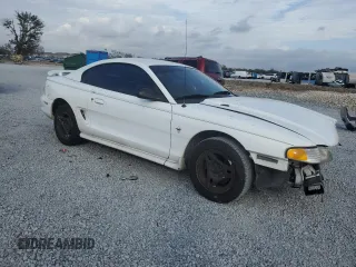 1997 Ford Mustang with VIN 1FALP4044VF174876, listed as a Copart auction lot 41601355 with 103,828 mi miles and Salvage Title. Bid and sale history available at carsss.com. Image 4.