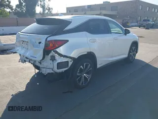 2021 Lexus RX 450h with VIN 2T2HGMDA2MC071281, listed as a IAAI auction lot 42587770 with 88,009 mi miles and . Bid and sale history available at DreamBid. Image 4.