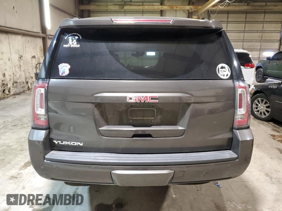 2020 GMC Yukon SLT Standard Edition with VIN 1GKS2DKC5LR286112, listed as a Copart auction lot 82692994 with 87,959 mi miles and Salvage Title. Bid and sale history available at carsss.com. Image 6.
