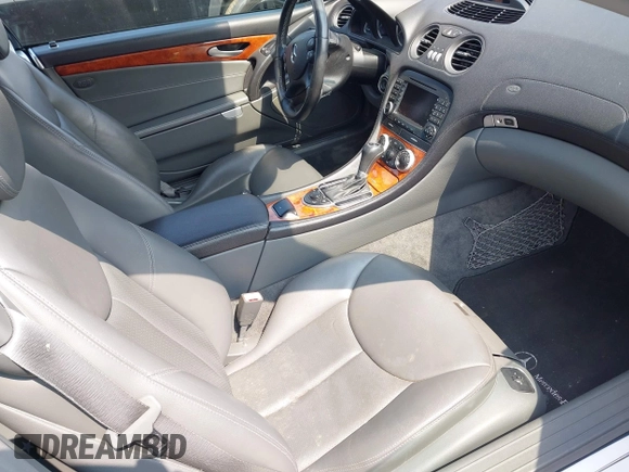 2005 Mercedes-Benz SL 500 with VIN WDBSK75F25F088450, listed as a IAAI auction lot 42424662 with 104,259 mi miles and . Bid and sale history available at DreamBid. Image 5.