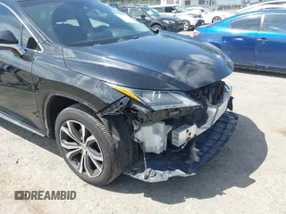 2016 Lexus RX 350 with VIN 2T2BZMCA9GC046531, listed as a IAAI auction lot 42704126 with 103,928 mi miles and . Bid and sale history available at DreamBid. Image 6.