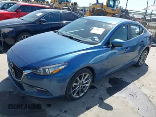 2018 Mazda 3 Touring with VIN 3MZBN1V38JM206827, listed as a IAAI auction lot 41983631 with 51,303 mi miles and . Bid and sale history available at DreamBid. Image 2.