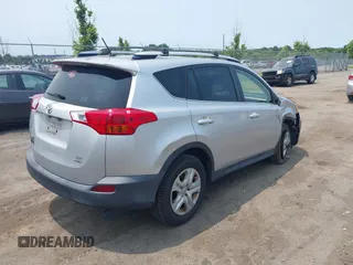 2015 Toyota RAV4 LE with VIN JTMBFREV6FJ039453, listed as a IAAI auction lot 42388671 with 200,304 mi miles and . Bid and sale history available at DreamBid. Image 4.