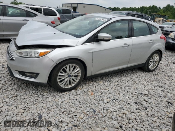 2017 Ford Focus Titanium with VIN 1FADP3N20HL320461, listed as a Copart auction lot 60292955 with 76,319 mi miles and Clean title. Bid and sale history available at DreamBid. Image 1.