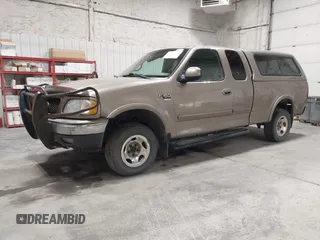 2001 Ford F-150 XL z VIN 1FTRX18W91NB49304, wystawiony jako IAAI lot #42316935 z przebiegiem 258 410 mil mil oraz . Historia ofert i sprzedaży dostępna na DreamBid. Obrazek 2.